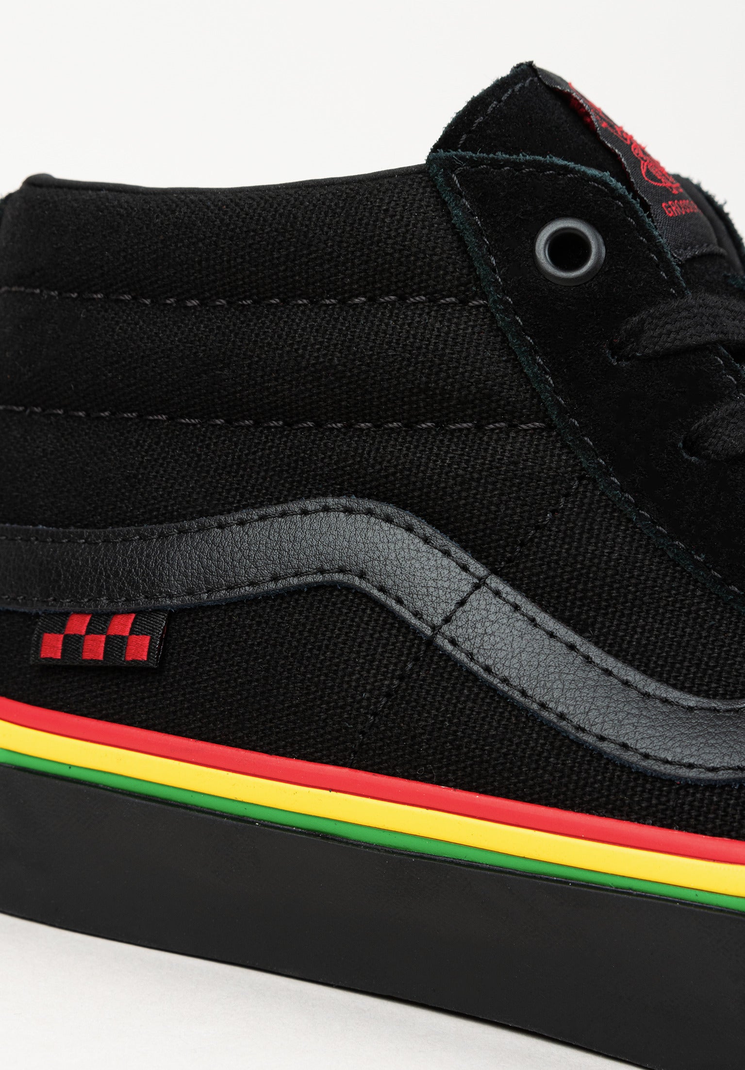 Vans rasta logo on sale